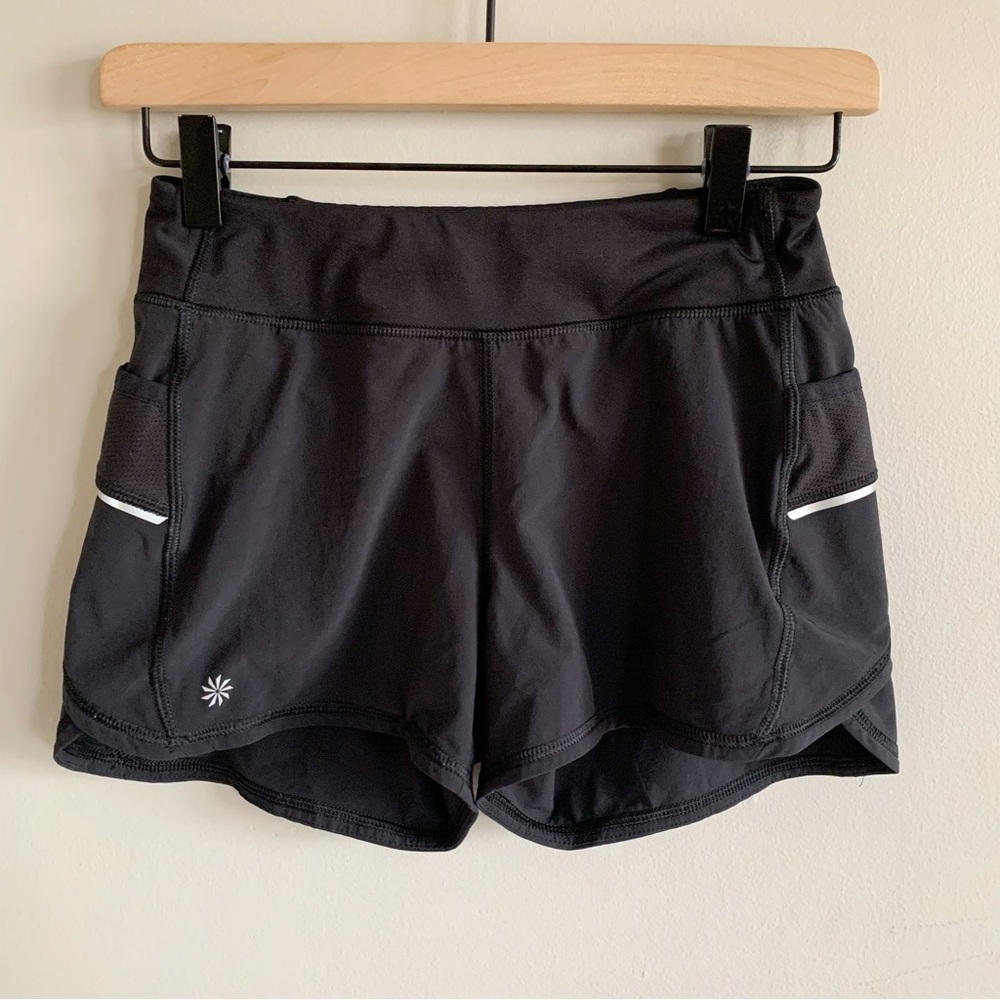 Athleta • girls athletic shorts large 12